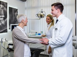 Woman meeting dentists